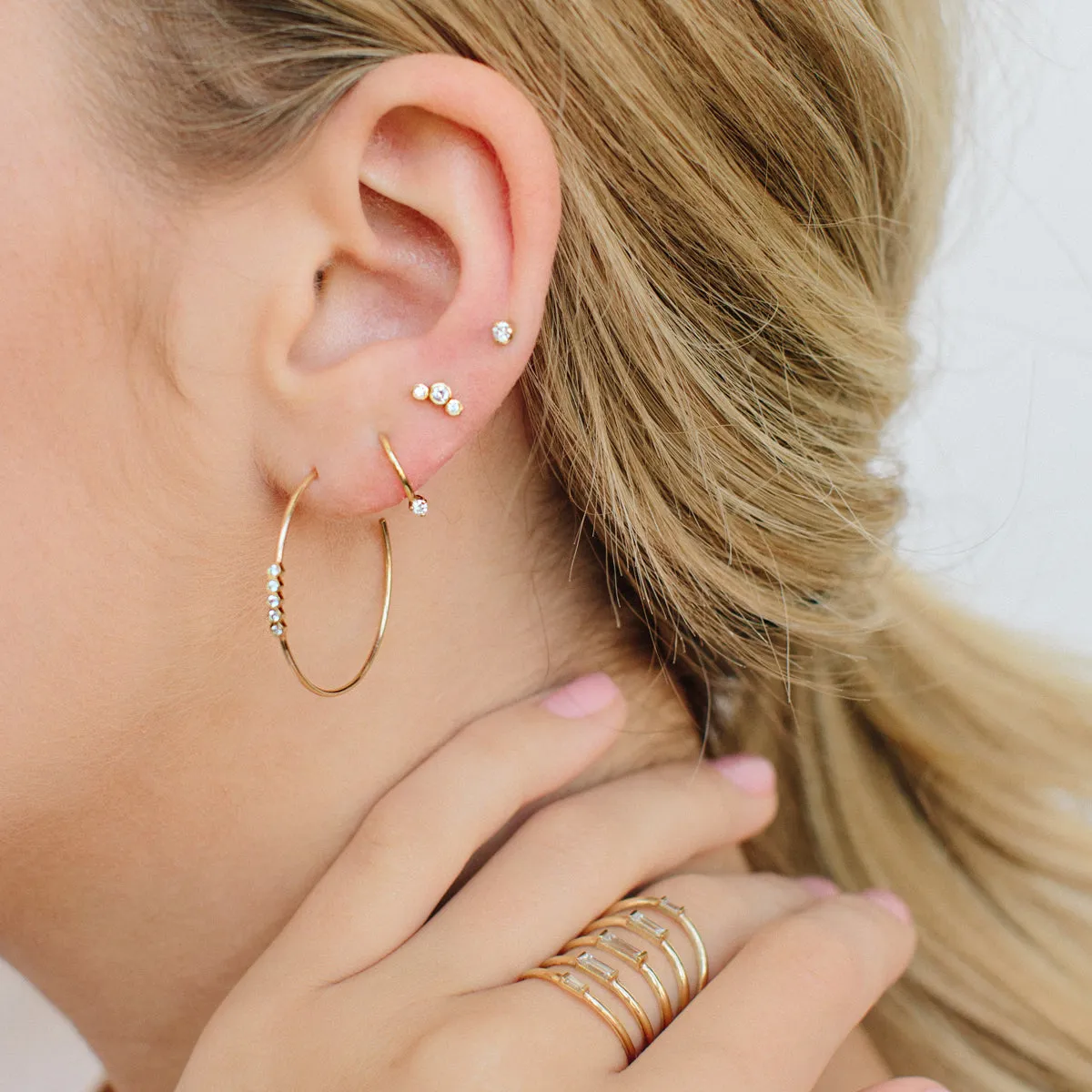 14k 3 Small Graduated Diamond Bezel Studs